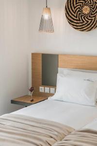A bed or beds in a room at Villa Iokasti - Ionian Treasure Villas