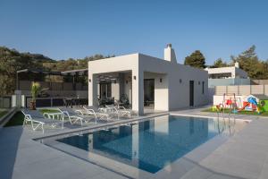The swimming pool at or close to Exquisite Villas with Enchanting Surroundings, By ThinkVilla