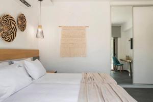 A bed or beds in a room at Villa Iokasti - Ionian Treasure Villas