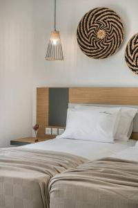 A bed or beds in a room at Villa Iokasti - Ionian Treasure Villas