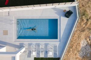 The swimming pool at or close to Exquisite Villas with Enchanting Surroundings, By ThinkVilla