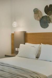 A bed or beds in a room at Villa Iokasti - Ionian Treasure Villas