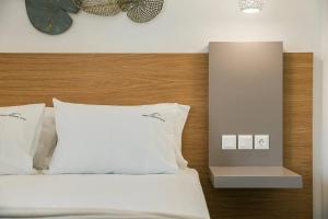 A bed or beds in a room at Villa Iokasti - Ionian Treasure Villas