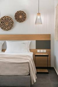 A bed or beds in a room at Villa Iokasti - Ionian Treasure Villas