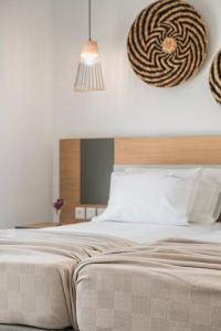 A bed or beds in a room at Villa Iokasti - Ionian Treasure Villas