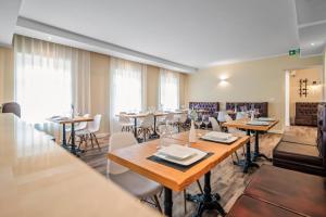 Posezení v ubytování TOSCANINA Garni Hotel