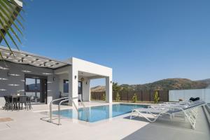 The swimming pool at or close to Exquisite Villas with Enchanting Surroundings, By ThinkVilla
