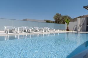 The swimming pool at or close to Exquisite Villas with Enchanting Surroundings, By ThinkVilla