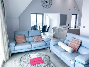 A seating area at Waterstone House Penthouse Apartment