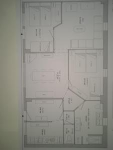 a black and white floor plan of a building at Gite de vacances Residence La Babaute LES ROUSSES in Les Rousses