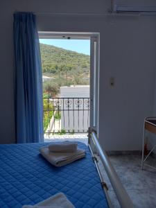 Posteľ alebo postele v izbe v ubytovaní Flisvos House + 28 fotografií
