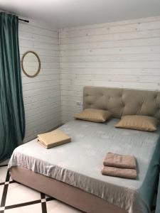 Postel nebo postele na pokoji v ubytování Svitiaz Griada