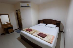 Кровать или кровати в номере Phi Phi Blue Lagoon