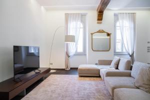 TV a/nebo společenská místnost v ubytování Relais La Torre