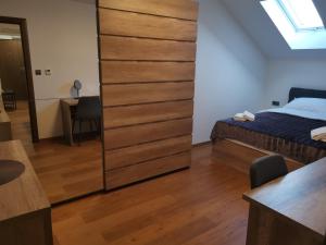 Ein Bett oder Betten in einem Zimmer der Unterkunft Nibela Apartments