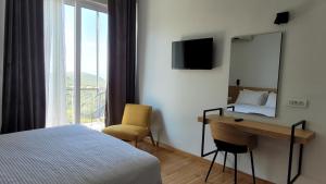 Postel nebo postele na pokoji v ubytování Theoxenia Hotel