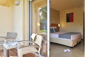 Postel nebo postele na pokoji v ubytování Hotel Costa Salina