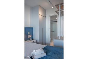 Cama o camas de una habitación en anyLife Black Faria Lima