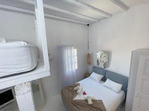 Postel nebo postele na pokoji v ubytování myMykonos Villa I