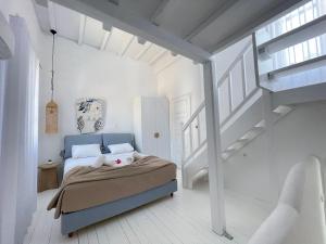 Postel nebo postele na pokoji v ubytování myMykonos Villa I