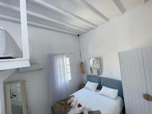Postel nebo postele na pokoji v ubytování myMykonos Villa I