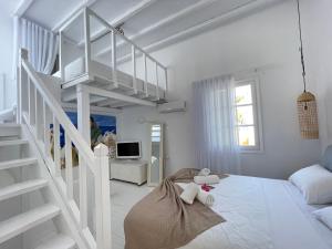 Postel nebo postele na pokoji v ubytování myMykonos Villa I
