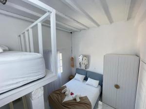 Postel nebo postele na pokoji v ubytování myMykonos Villa I