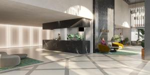 a lobby with a counter and people in a building at Studio Occidental banus in Marbella +23 photos