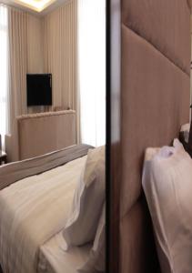 Un ou plusieurs lits dans un hébergement de l'établissement قوت المصيف للشقق الفندقية