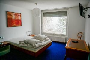 Kama o mga kama sa kuwarto sa Grosse 4 Zimmer Wohnung mit traumhafter Aussicht