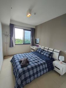 เตียงในห้องที่ unixx seaview