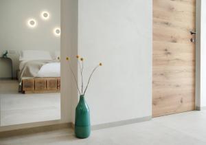 Posteľ alebo postele v izbe v ubytovaní Una Villa - Amalfi Boutique Rooms B&B