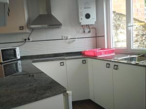 Kuchyň nebo kuchyňský kout v ubytování Vivienda A Travesía Dos Soños