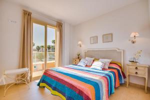 A bed or beds in a room at Ideal Property Mallorca - Tarongina Még 17 kép