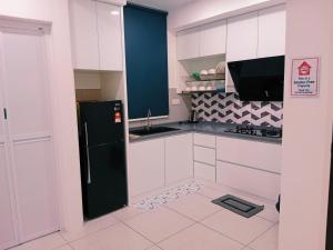 Kuchyň nebo kuchyňský kout v ubytování Preferred30 3R2B 7pax Meritus Perai