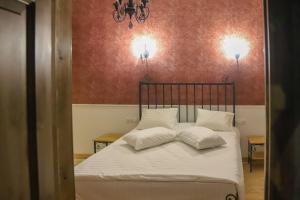 Postel nebo postele na pokoji v ubytování Nur Guest House