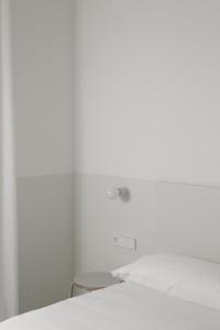 Postel nebo postele na pokoji v ubytování HOTEL LA FONDA B&B