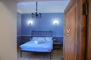 Postel nebo postele na pokoji v ubytování Nur Guest House