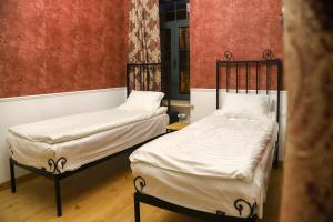 Postel nebo postele na pokoji v ubytování Nur Guest House