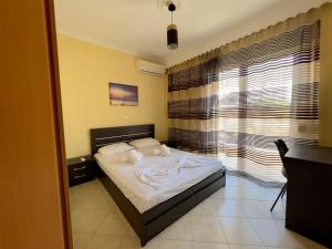 Postel nebo postele na pokoji v ubytování Atrium Luxurious Sea View Apartment