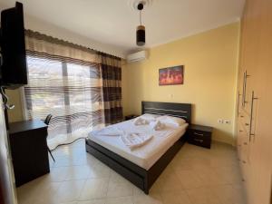Postel nebo postele na pokoji v ubytování Atrium Luxurious Sea View Apartment