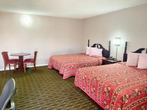 Postel nebo postele na pokoji v ubytování Bradbury Inn