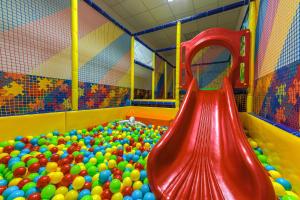 a large pile of balls in a ball pit at Oak Residence Hotel & Relax in Smolyan