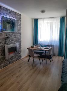 TV a/nebo společenská místnost v ubytování KLEPALSKI - Mountain Studio