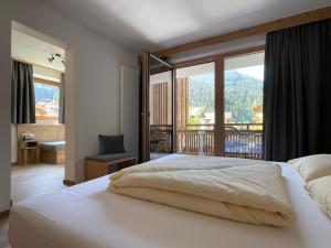 Posteľ alebo postele v izbe v ubytovaní Hotel & Suites Glück Auf