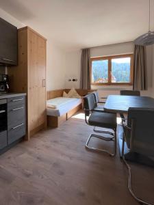 Posteľ alebo postele v izbe v ubytovaní Hotel & Suites Glück Auf