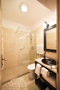 Kúpeľňa v ubytovaní Luxury city center Apartment ANGELS RM