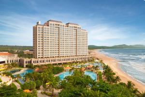 a view of a hotel and the beach at Holiday Inn Resort Ho Tram Beach by IHG in Ho Tram