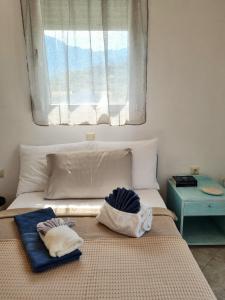 A bed or beds in a room at Physis - Seaview Maisonette