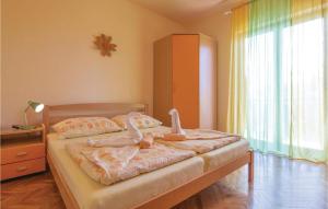 Posteľ alebo postele v izbe v ubytovaní Holiday Home Orihi Bb Croatia